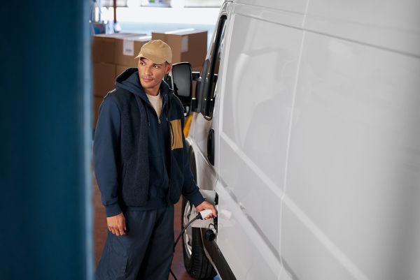 A Proace Max electric recharging at a charging station 