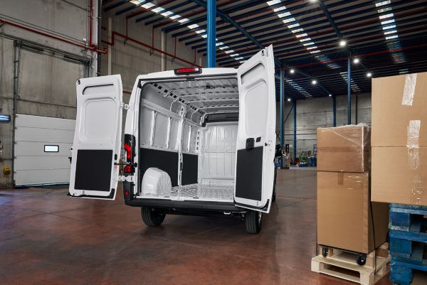 A Proace Max with its rear doors open for easy access