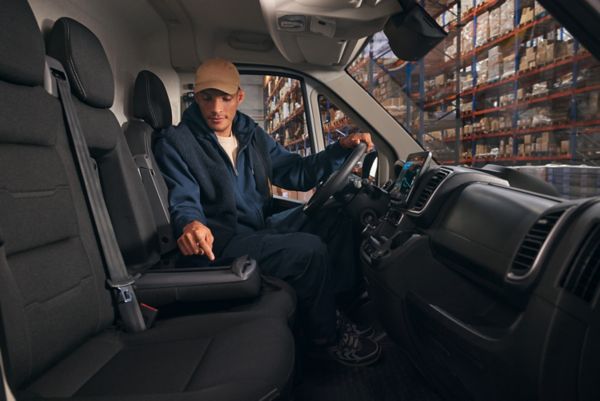 A driver makes use of the fold-down table 