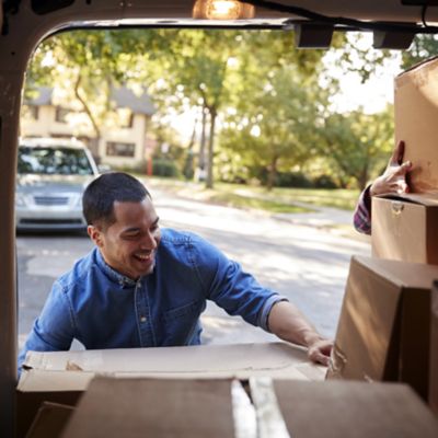 Man loading Proace vehicle