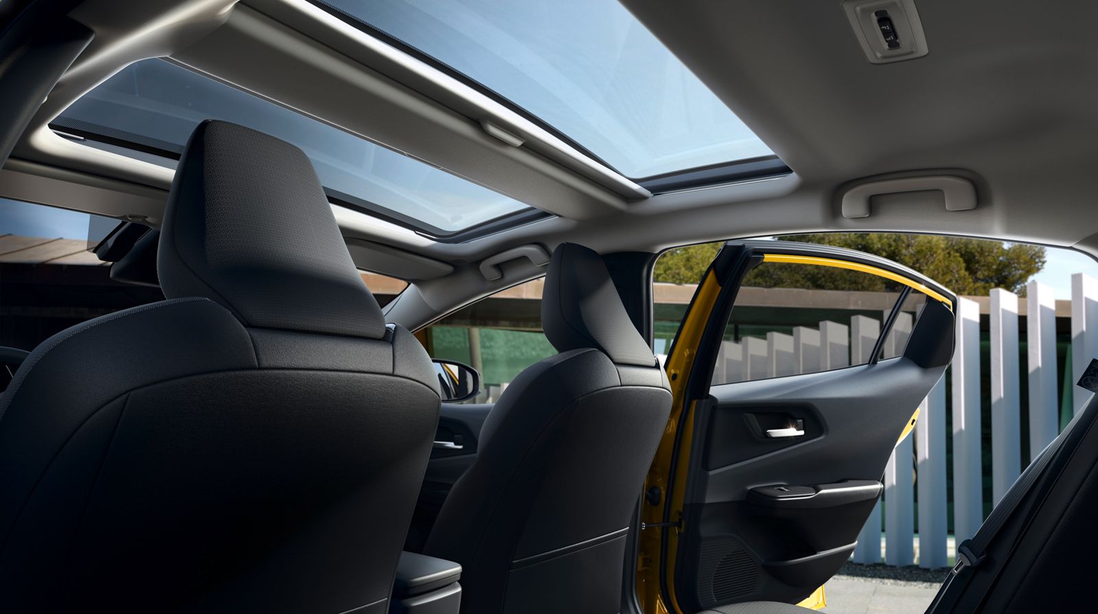 An owner enjoying the sun with Prius Plug-in Hybrid.