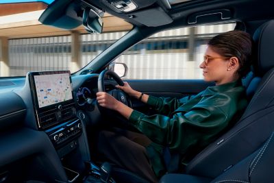 person in Toyota car