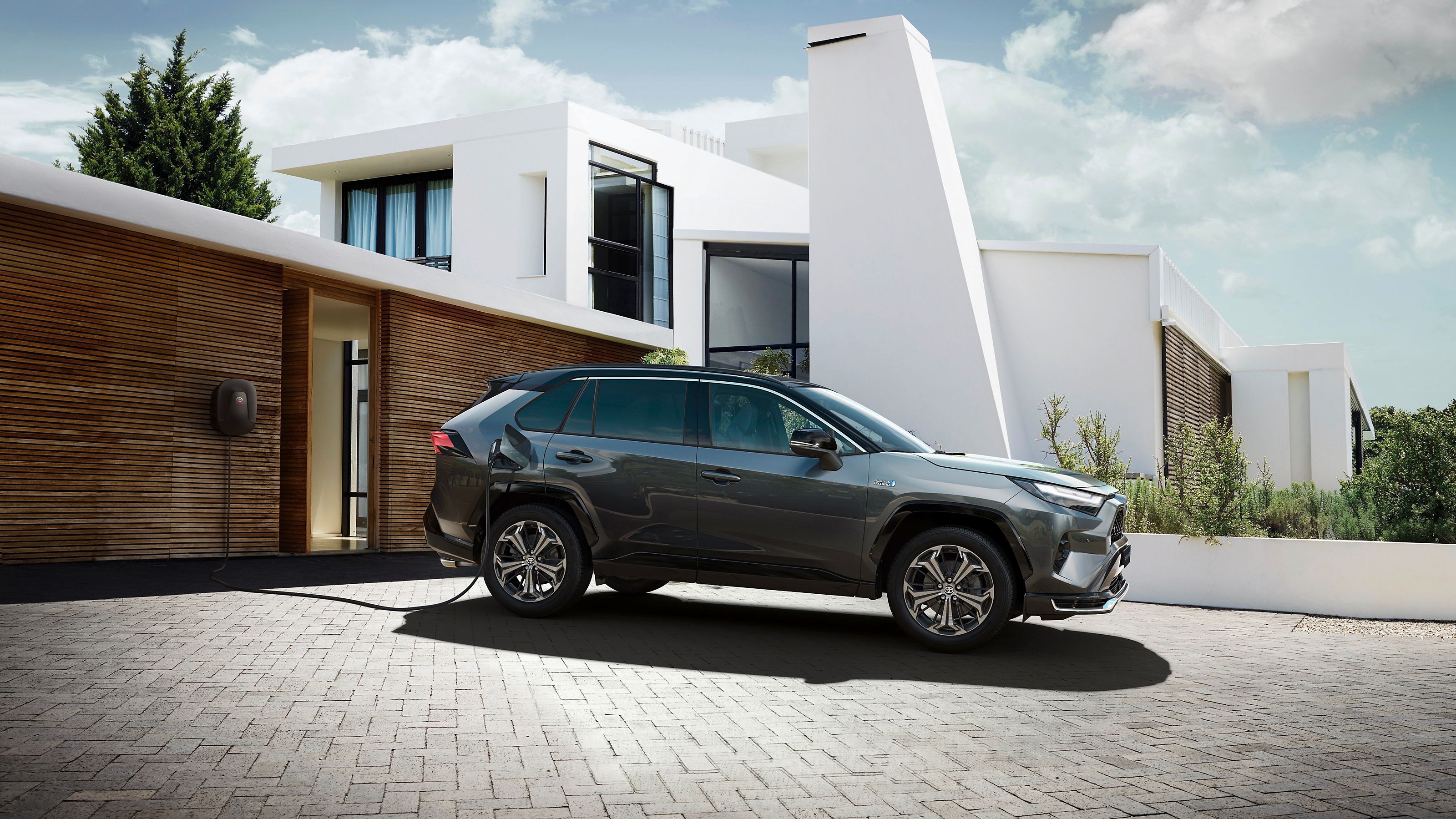 Toyota RAV4 Plug-in hybrid parked outside a house
