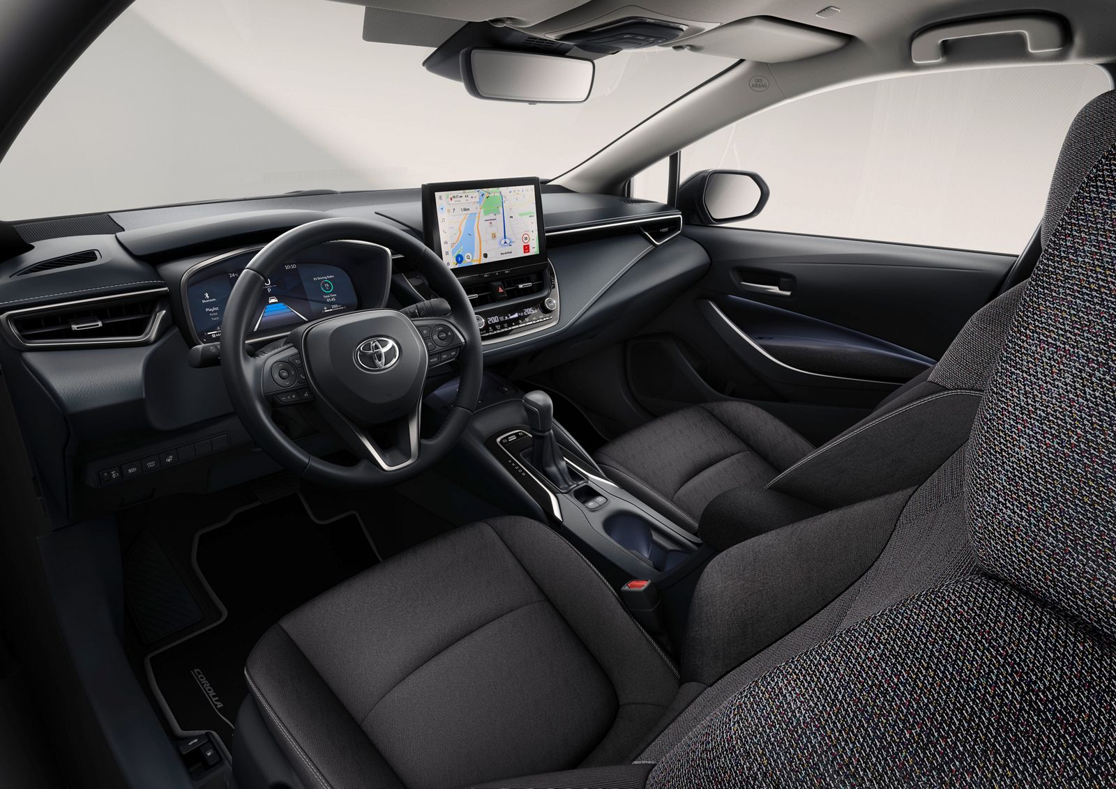 The Toyota Corolla Sedan’s steering wheel and multimedia touchscreen