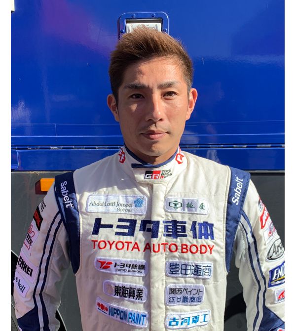 Team 1, Car 246 Driver Akira Miura looking to camera