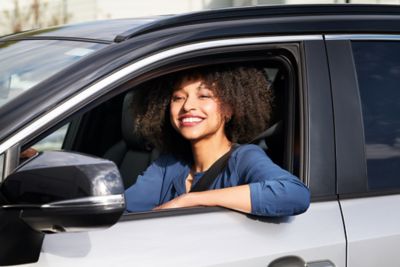 Happy girl driving 