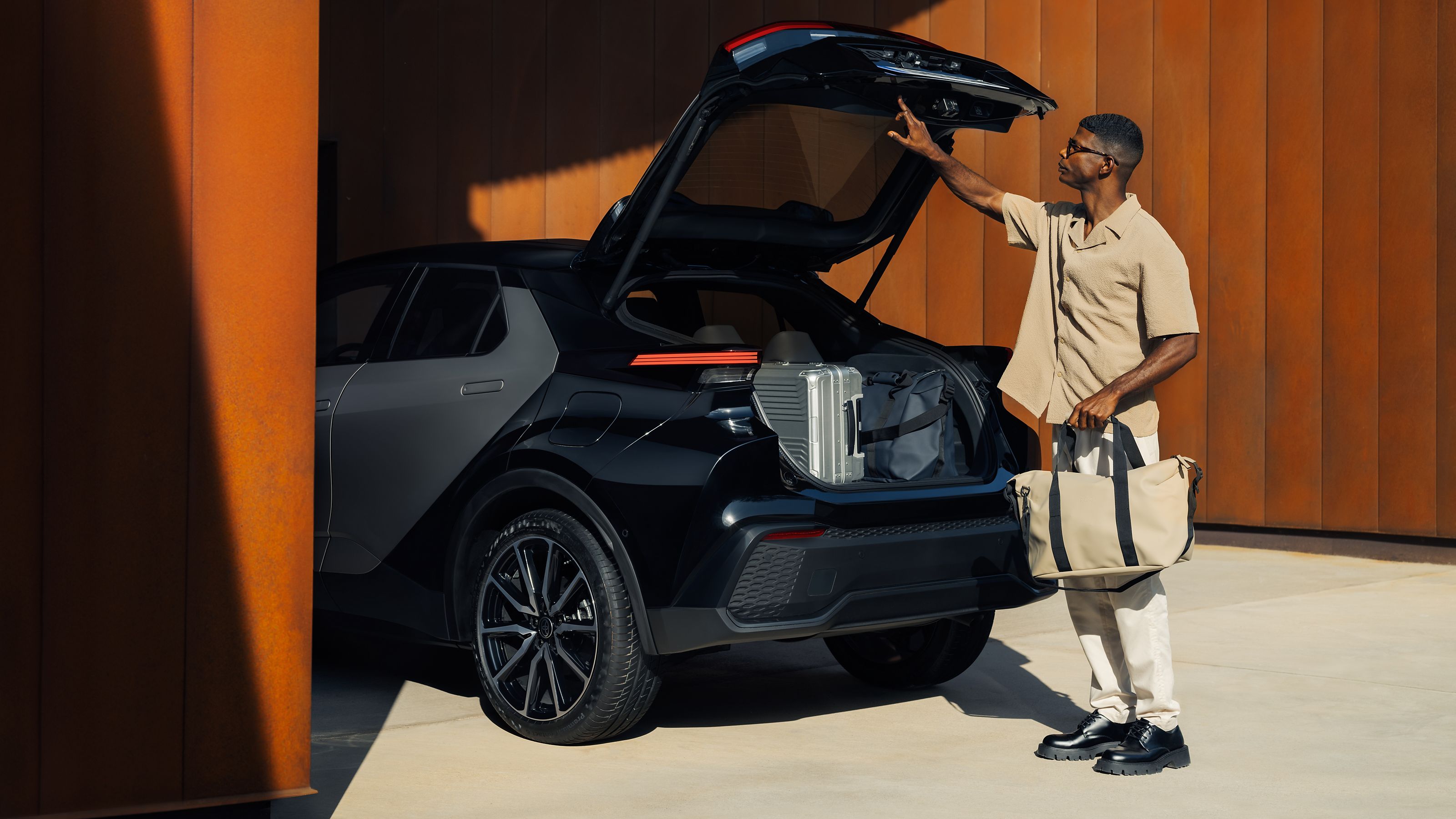 A Toyota C-HR owner enjoying the space within the C-HR boot