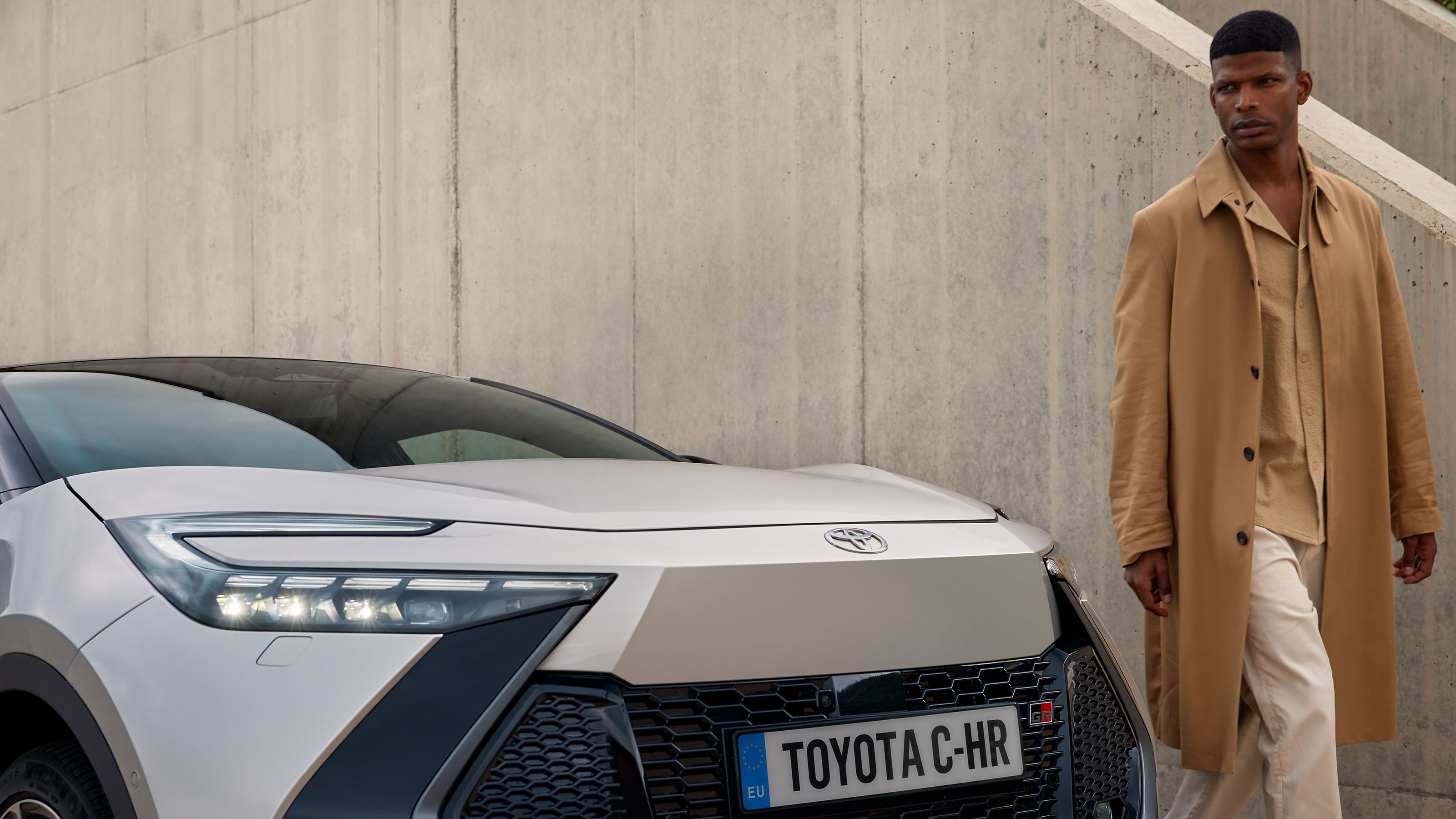 A Toyota C-HR owner waitingn for the car to charge