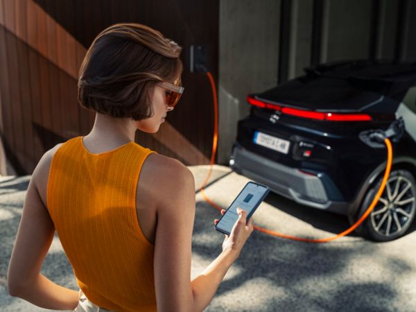 Woman charging car