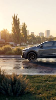 Toyota C-HR driving on city road