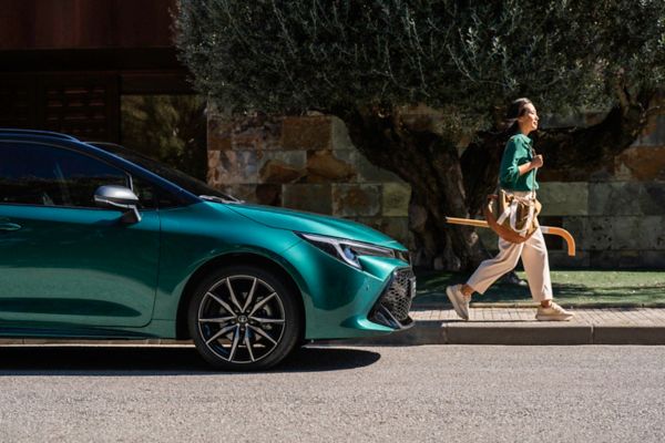 Toyota Corolla Touring Sports driving on city road