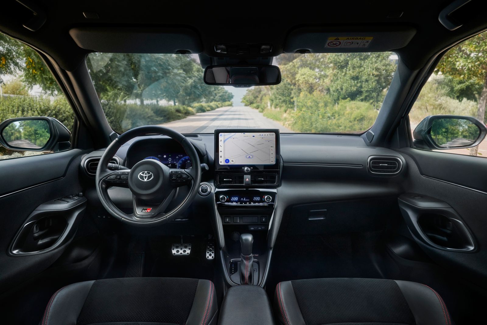 Woman driving in Yaris Cross