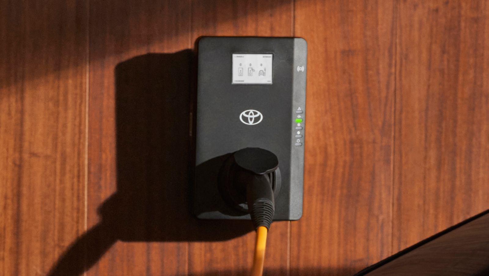 Close up of a Toyota Homecharging wallbox powering the Toyota Smart Charging solution.