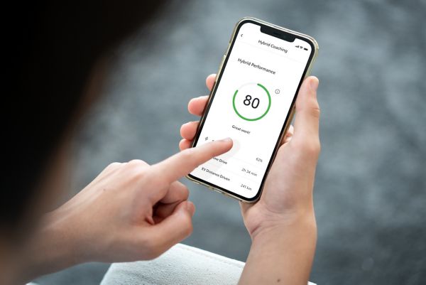person looking at MyToyota app on phone