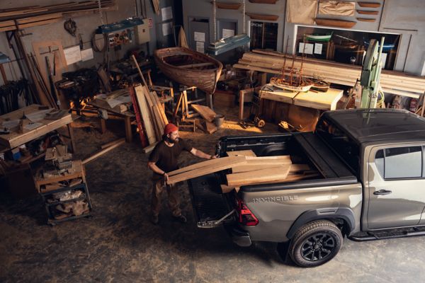 Man unloading a Toyota Hilux