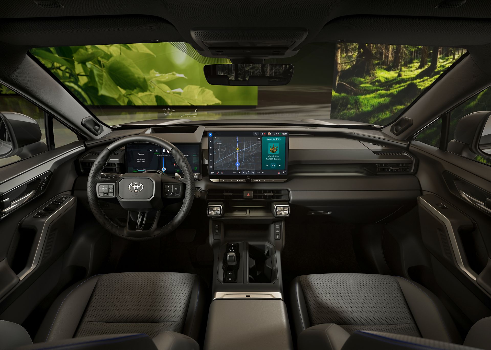 Cockpit van de RAV4 met volledig dashboard in beeld.