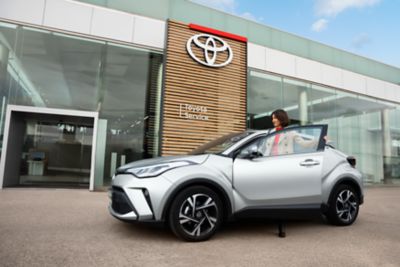 person entering their Toyota car