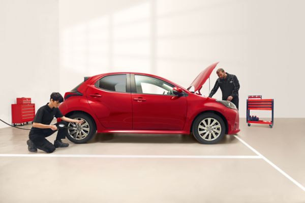 Toyota car being worked on in a garage