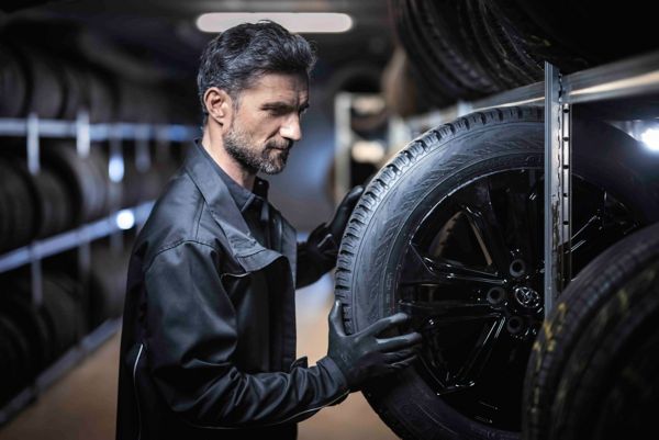 Toyota technician working on a tyre wheel