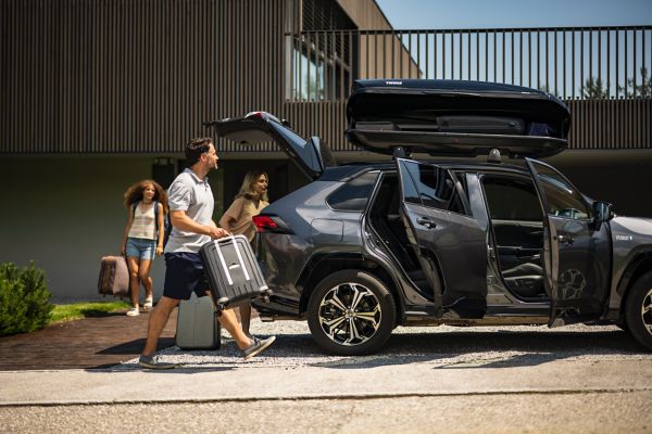 a family entering their Toyota car