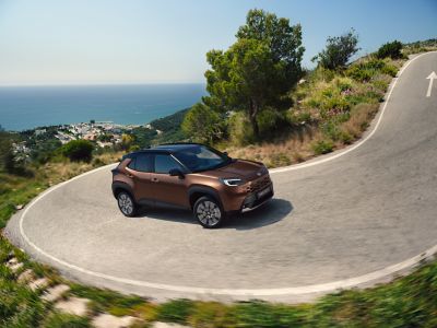 Toyota Yaris Cross driving uphill