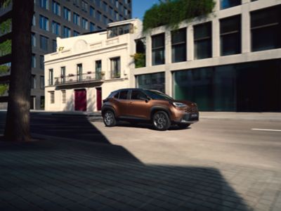 Toyota Yaris Cross driving on city road