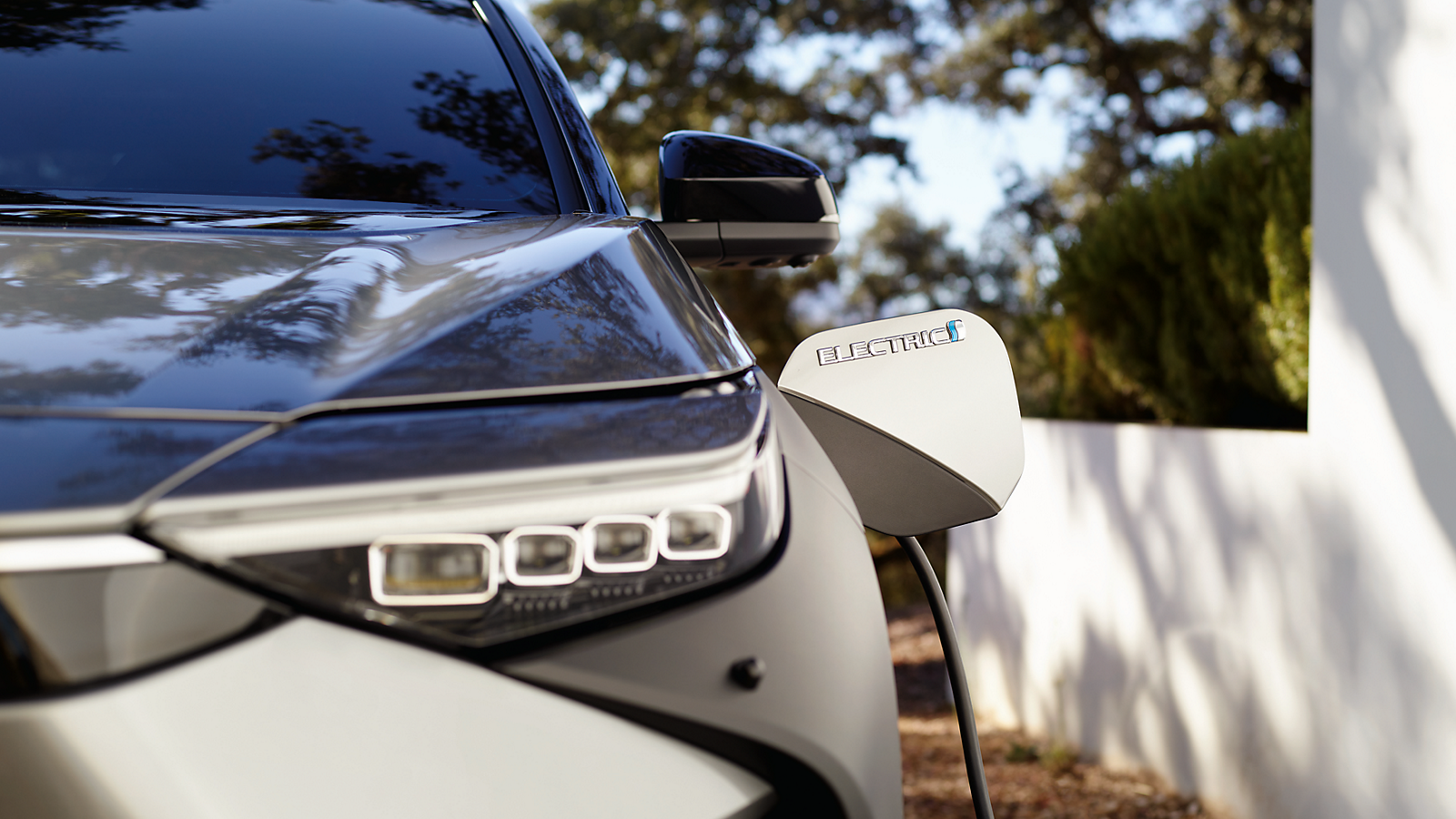 A Battery Electric Toyota bZ4X being charged at home