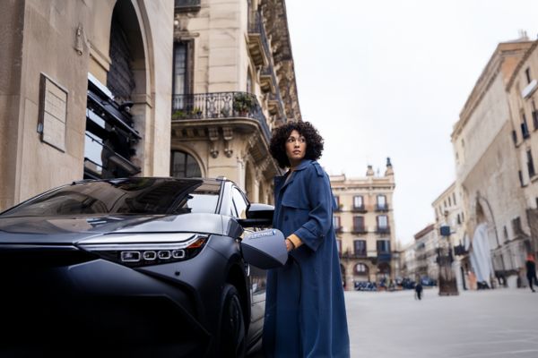 woman entering Toyota C-HR