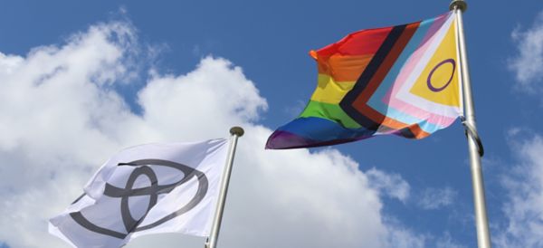 Toyota flag alongside the LGBTQ flag