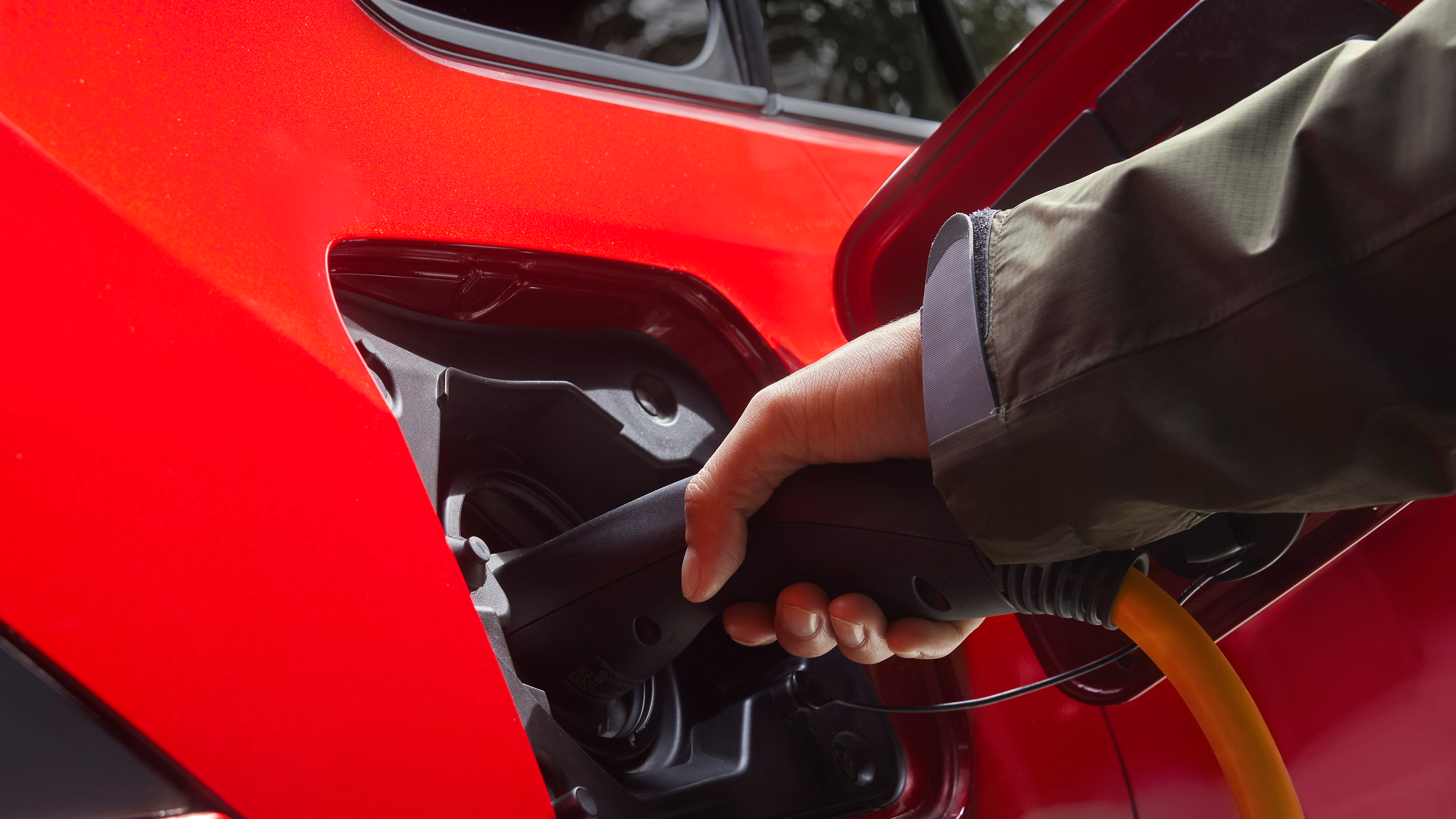 A Toyota RAV4 Plug-in Hybrid charges at home 
