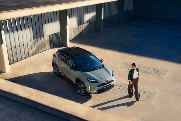 Toyota Yaris Cross owner confidently  walking away from their car