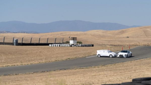 a car avoiding another in an AI safety driving test