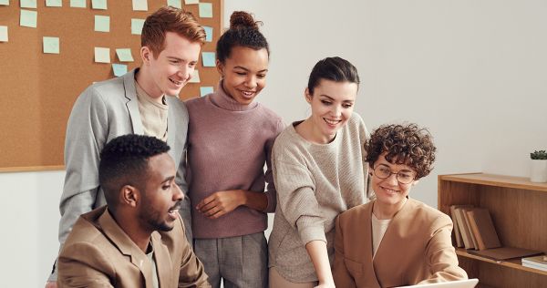 A group of people in a classroom 