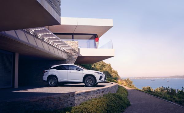 A Lexus RX parked at a coastal property