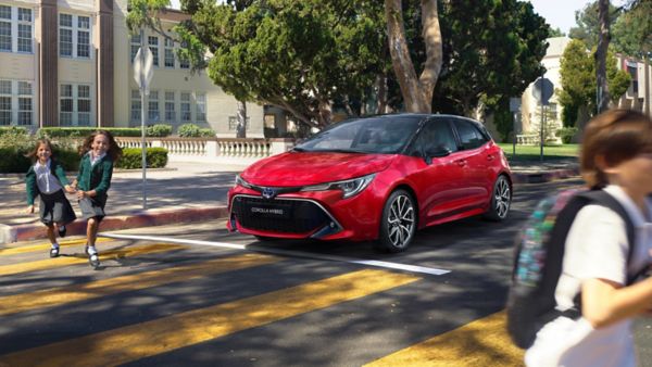 Toyota Corolla Hybrid waiting at a crossing