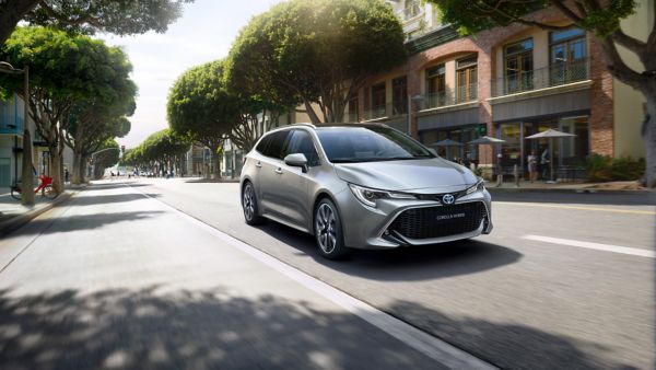 Toyota Corolla Commercial driving along a road