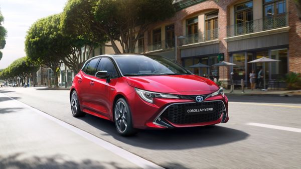 Toyota red Corolla hatchback