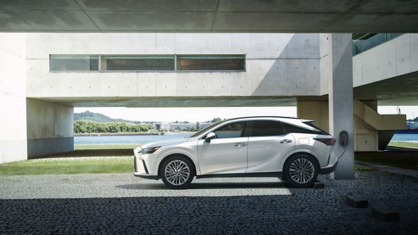 A Lexus RX plugging into a charging station