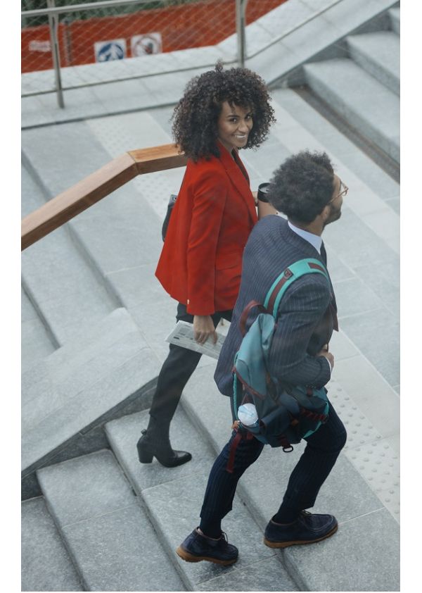 Kinto Join - two people walking up steps smiling