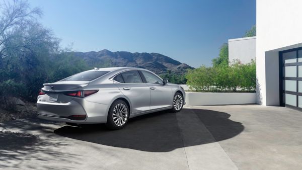 A Lexus ES approaching a corner in the road