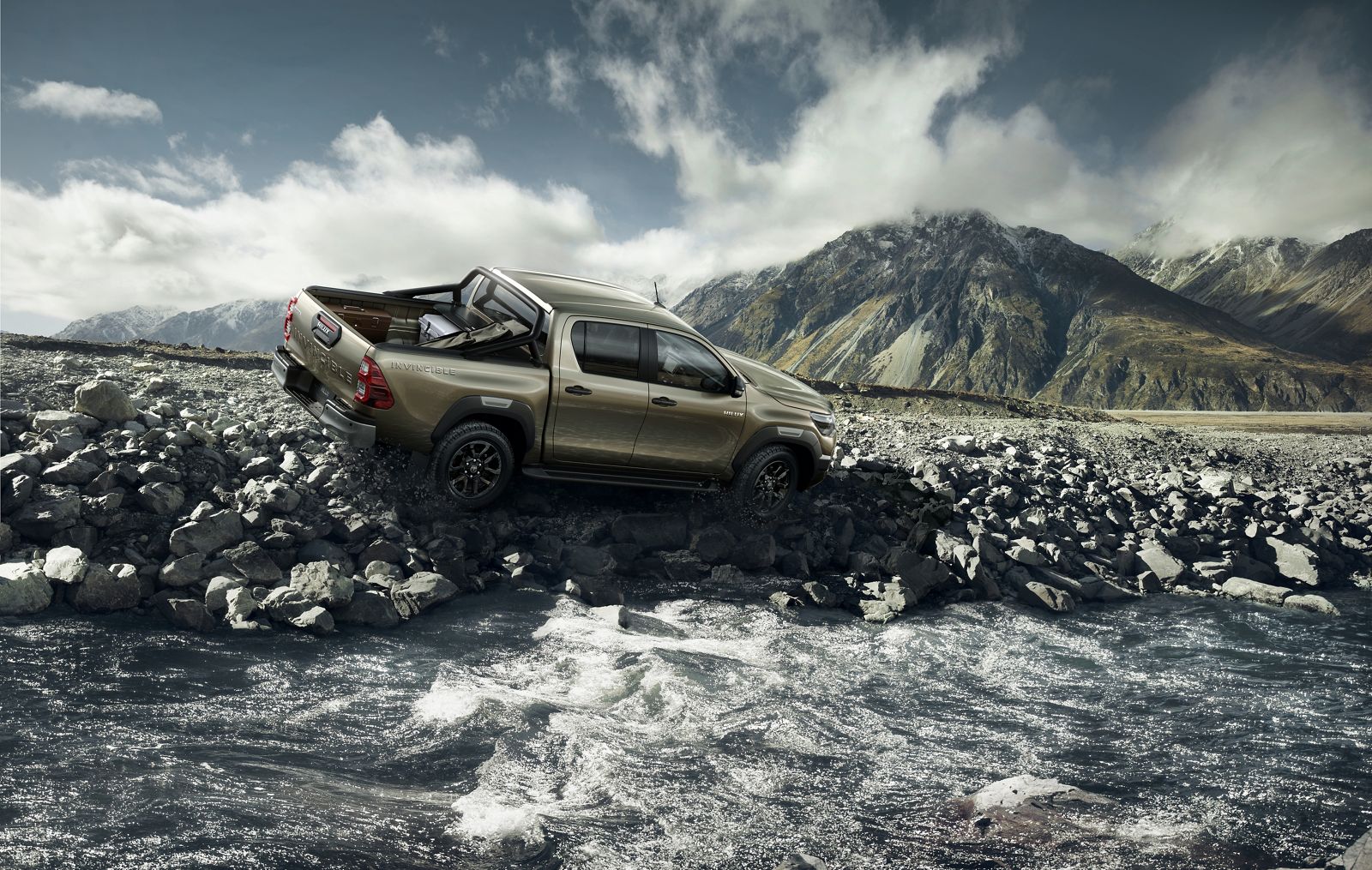 Hilux drives along an urban underpass
