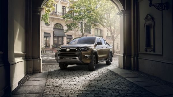 Toyota leasing Hilux driving through archway