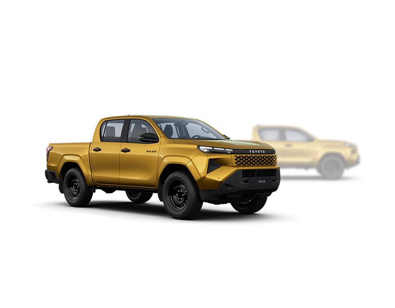 Gelber Toyota Hilux Mild-Hybrid steht diagonal zur Kamera, im Hintergrund ist unscharf ein grauer Hilux zu erkennen