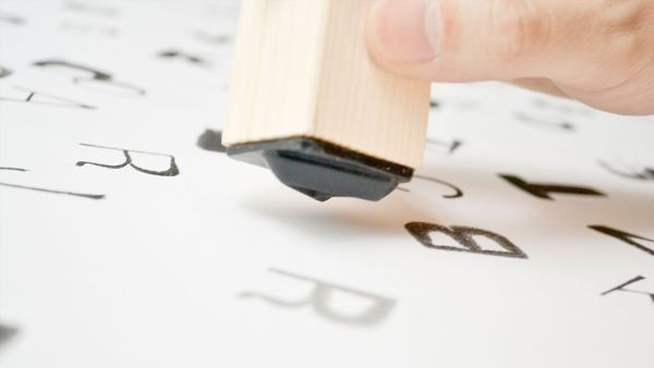 INSTAMP stamping letters of the alphabet