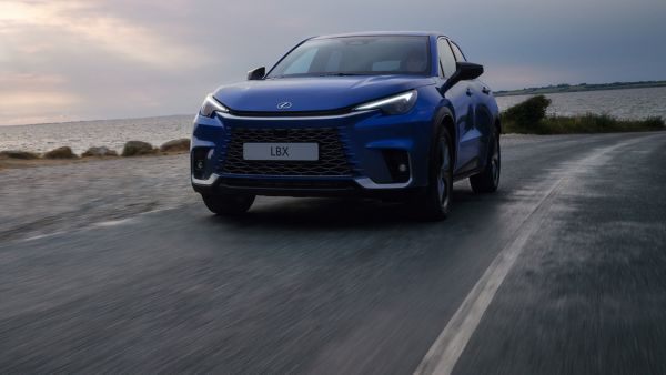 Lexus LBX driving on a coastal road