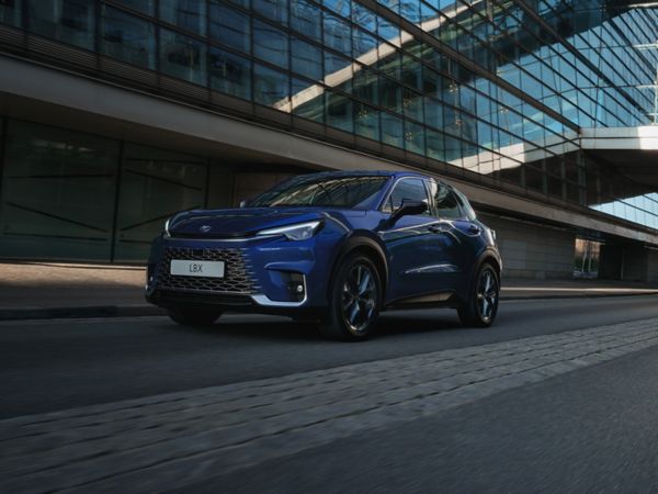 Lexus LBX driving in a city