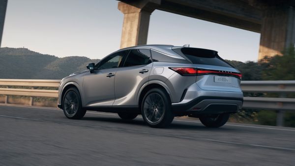 A hybrid Lexus in a garage