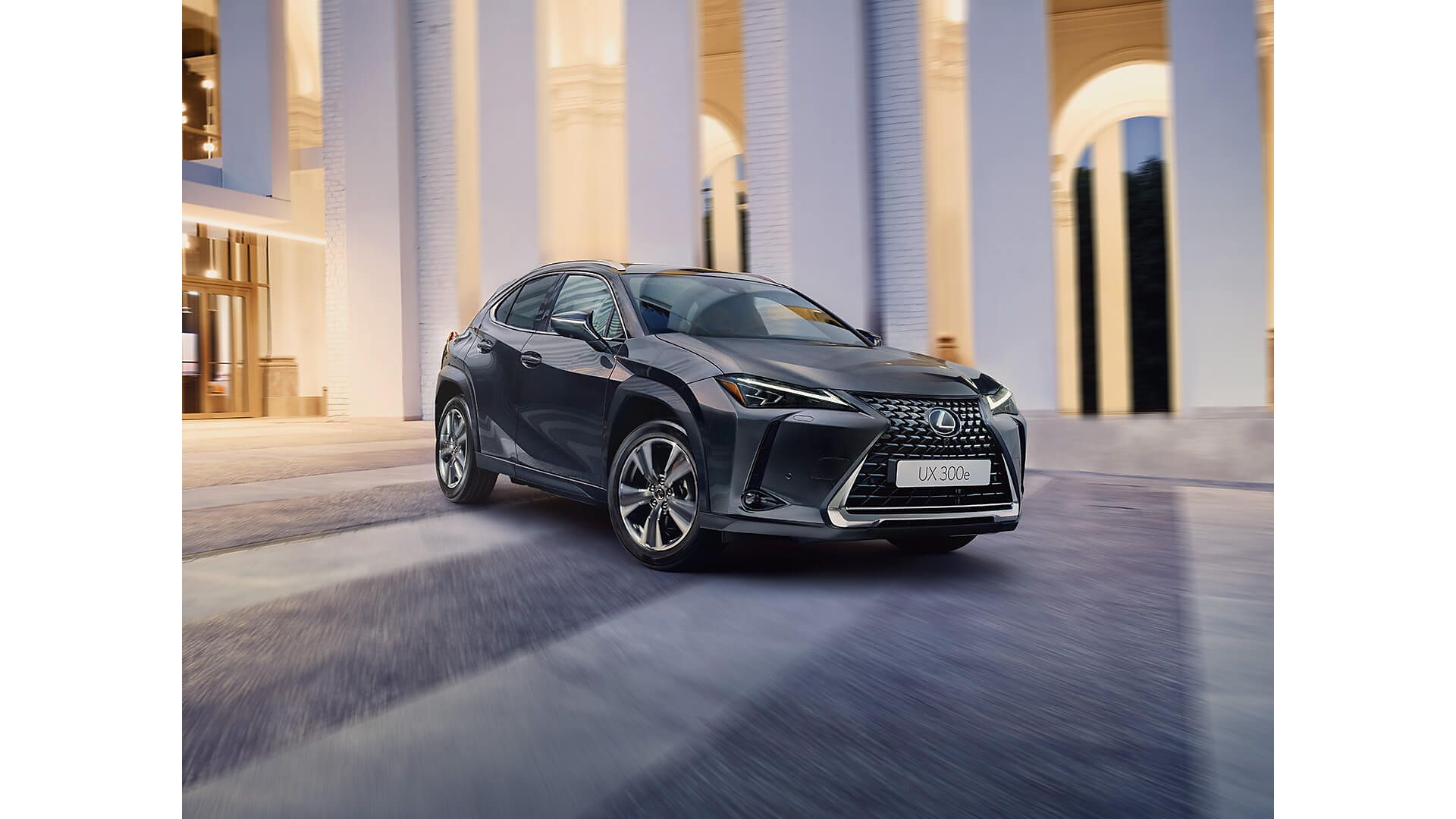 person pressing a button inside their Lexus UX 300e