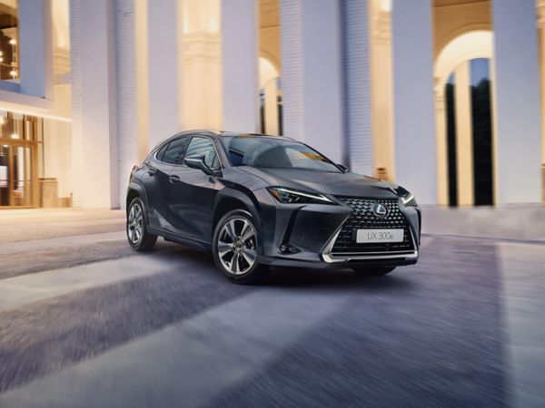 person pressing a button inside their Lexus UX 300e