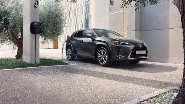 Lexus UX 300e being charged outside